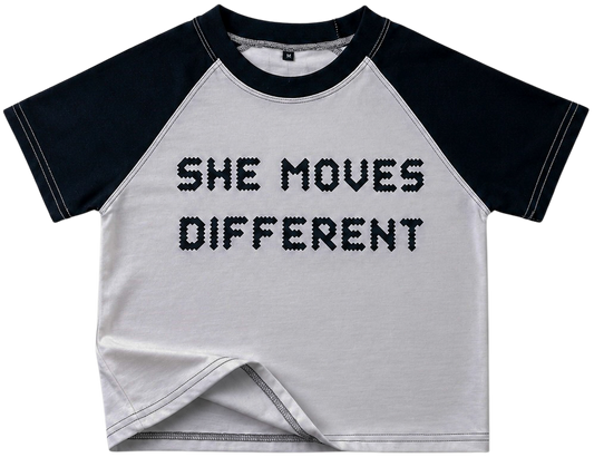 “SHE MOVES DIFFERENT” Cropped Raglan Tee